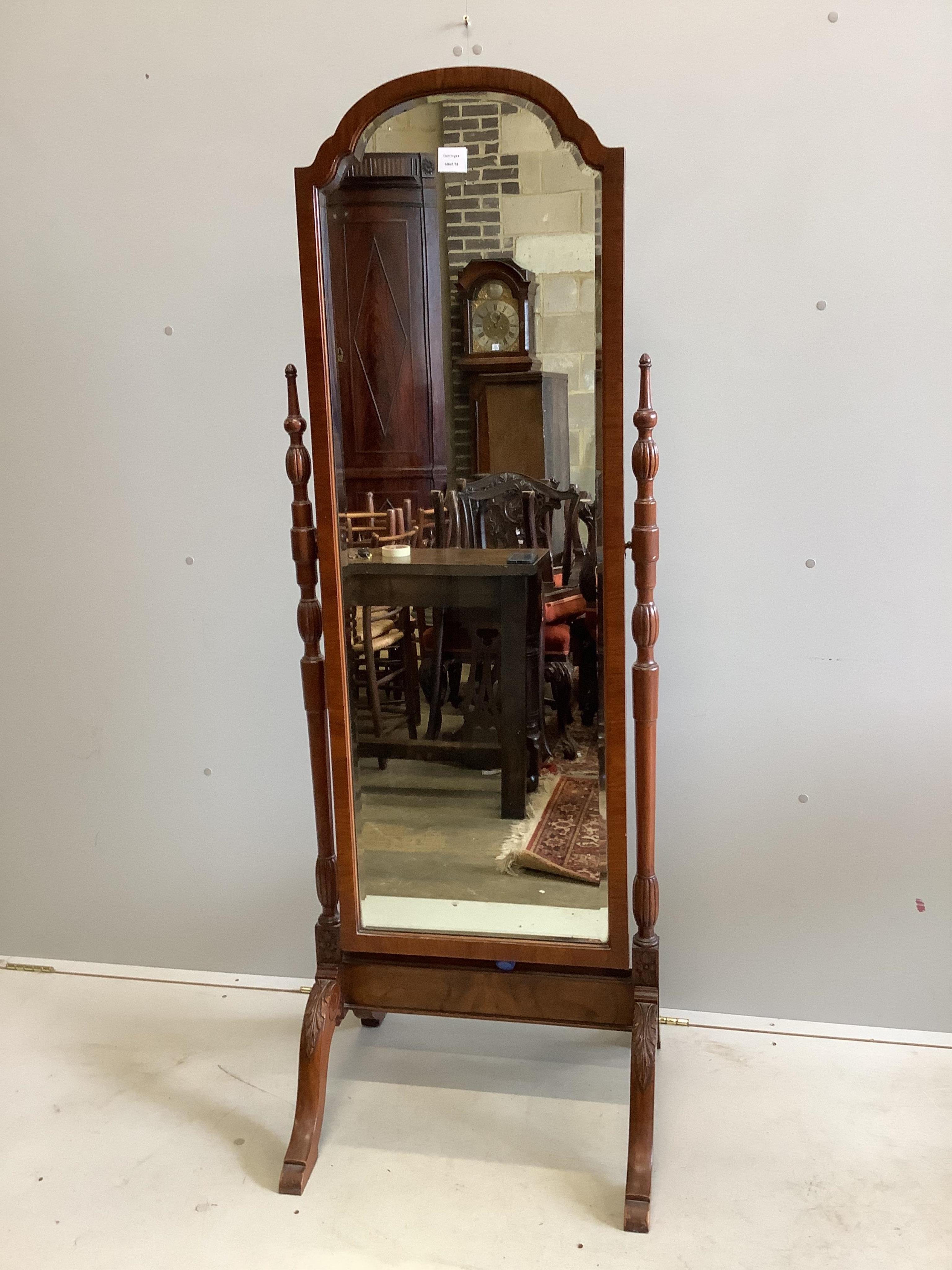 An early 20th century Queen Anne style walnut framed cheval mirror, width 58cm, height 165cm. Condition - good